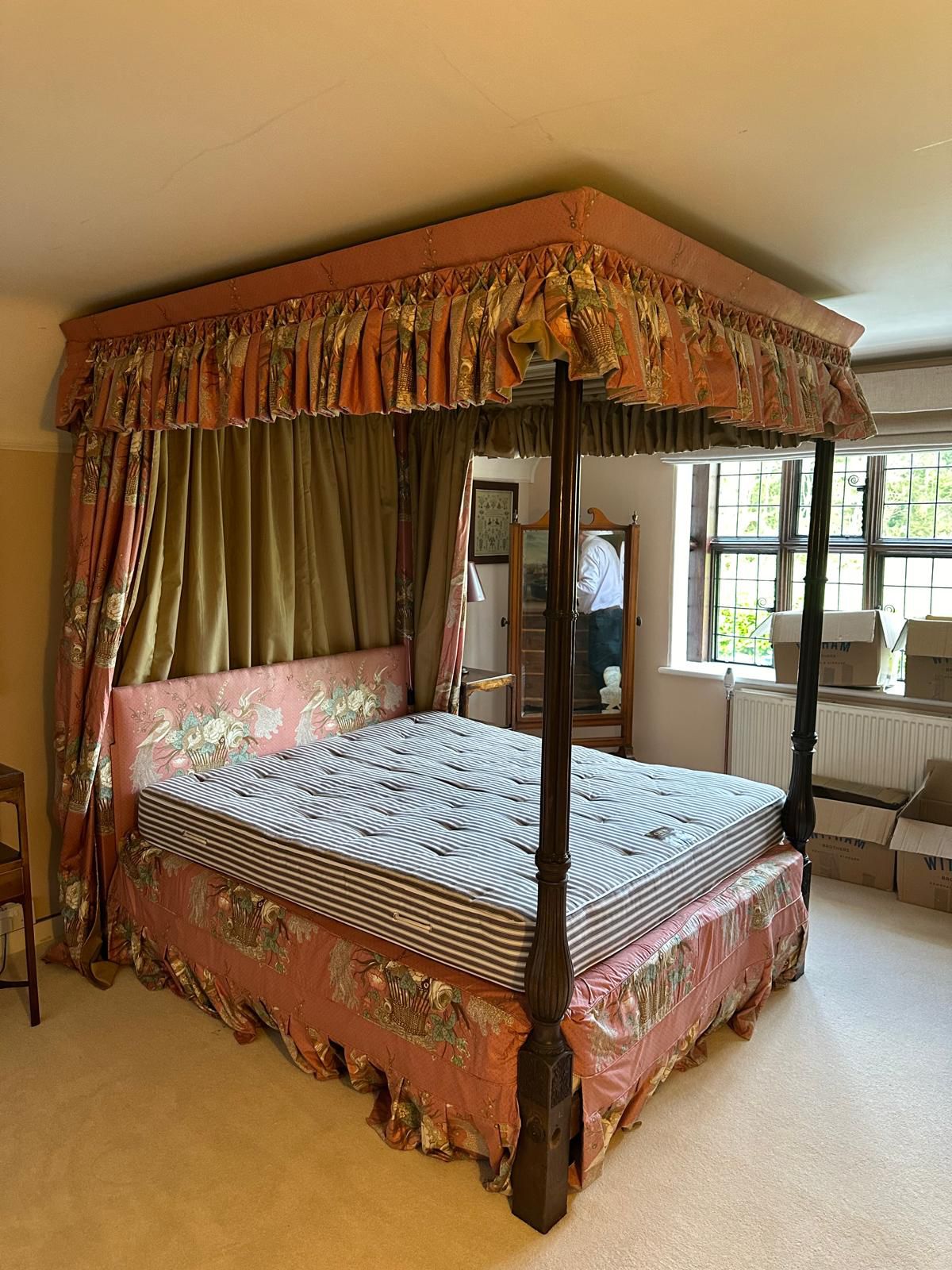 A George III style mahogany four poster bedstead